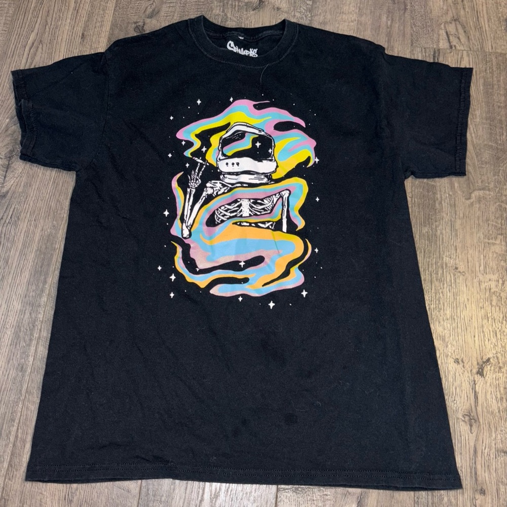 Spencer’s black tee shirt